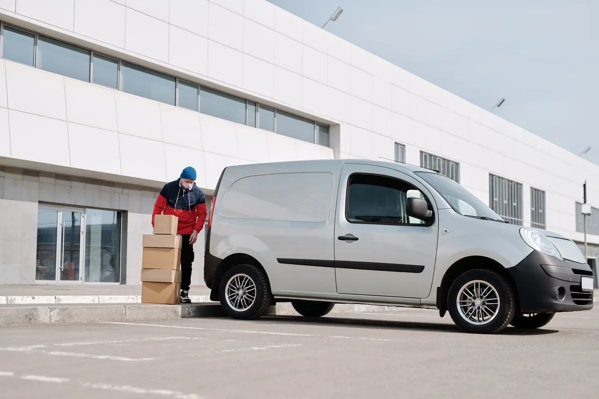 Courier van with parcels ready for same-day delivery